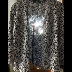 Lace cover up for thin or strapless dress.